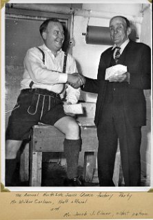 The annual Northside Swiss Cheese factory party.  Mr. Wilbur Carlson, Kraft Foods official, and Mr. Jacob J. Elmer, the oldest factory patron.